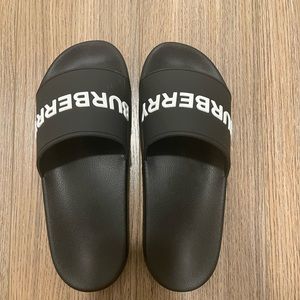 Black Burberry slides